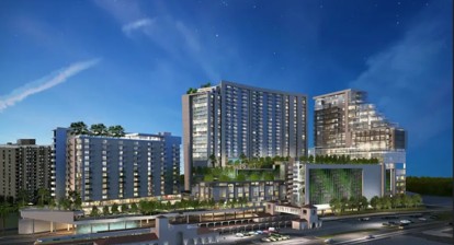 Mixed-use residential and retail complex at dusk